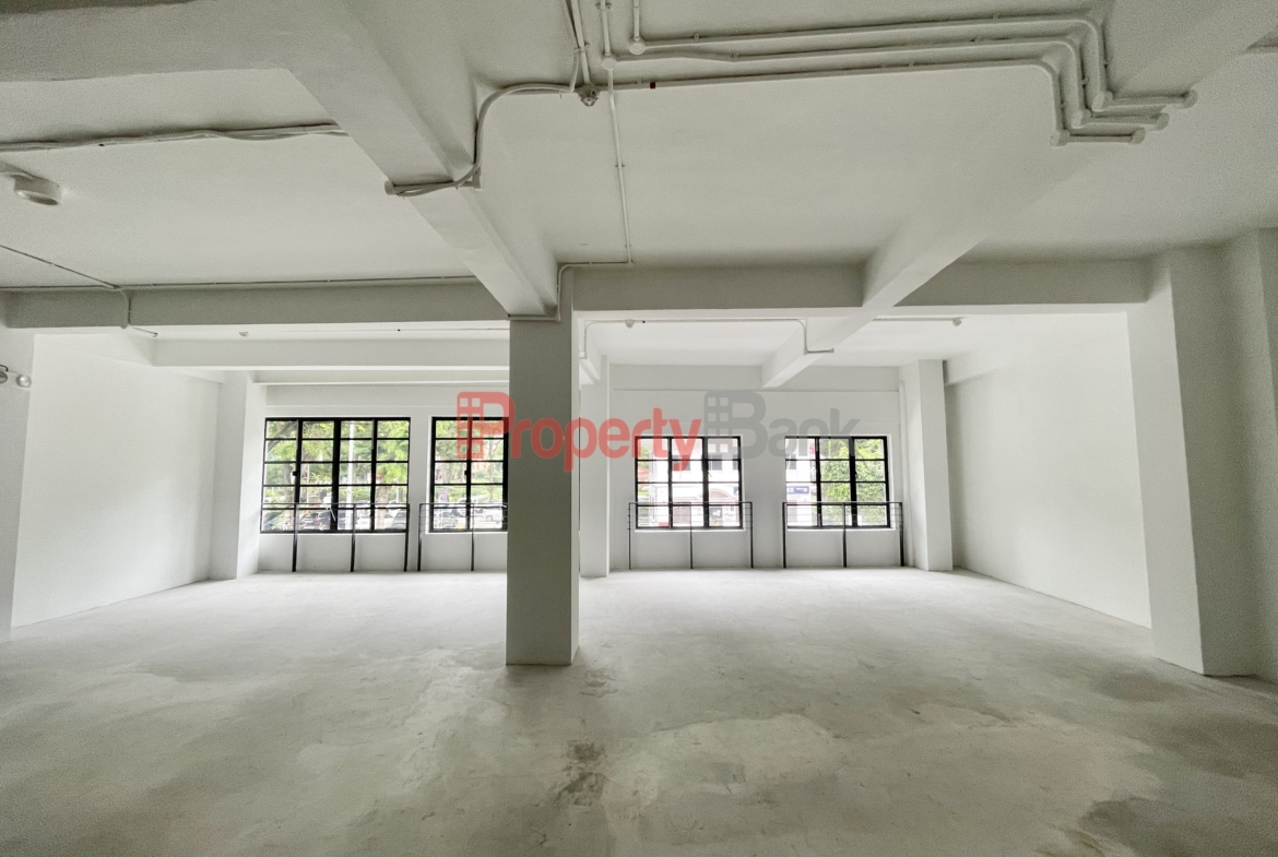 Open-plans space with large windows at 30 North Canal Road