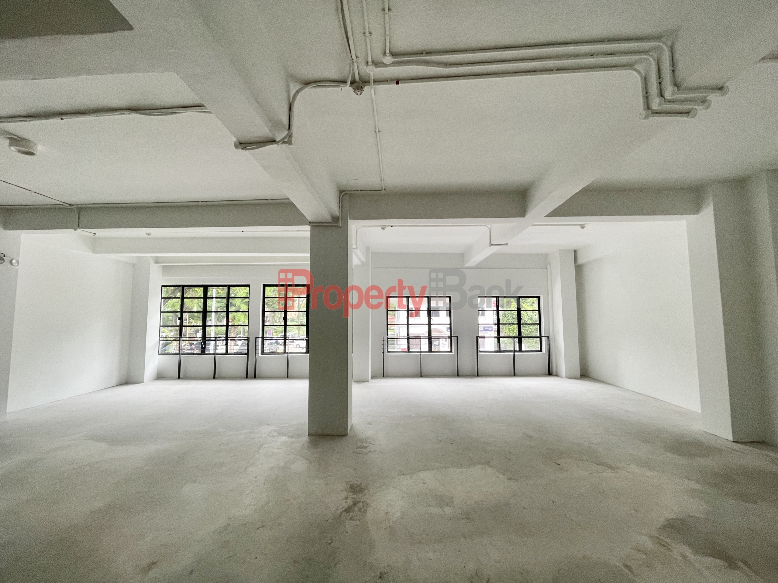Open-plans space with large windows at 30 North Canal Road